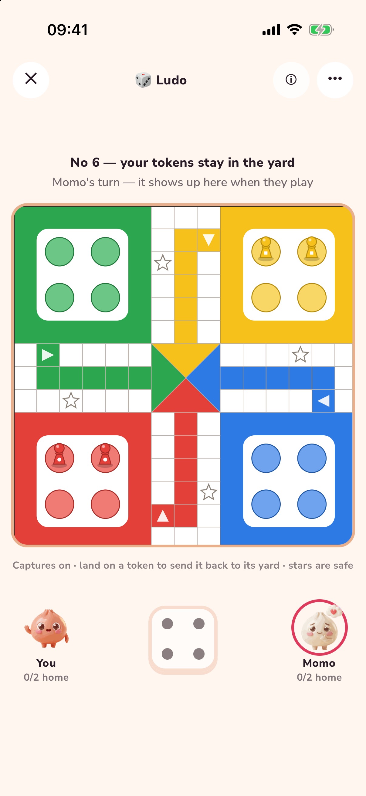 A game of Ludo in play